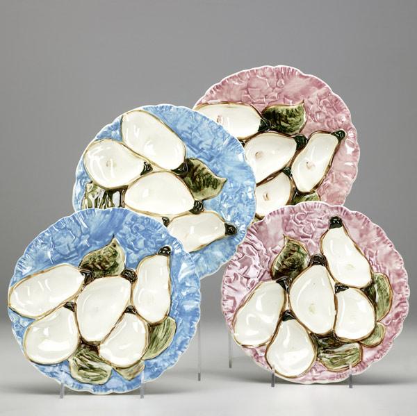 Appraisal: STANGL Four oyster plates two in pink and two in