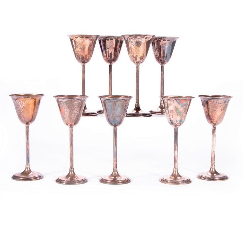 Appraisal: A set of nine sterling fluted drinking cups Nine sterling