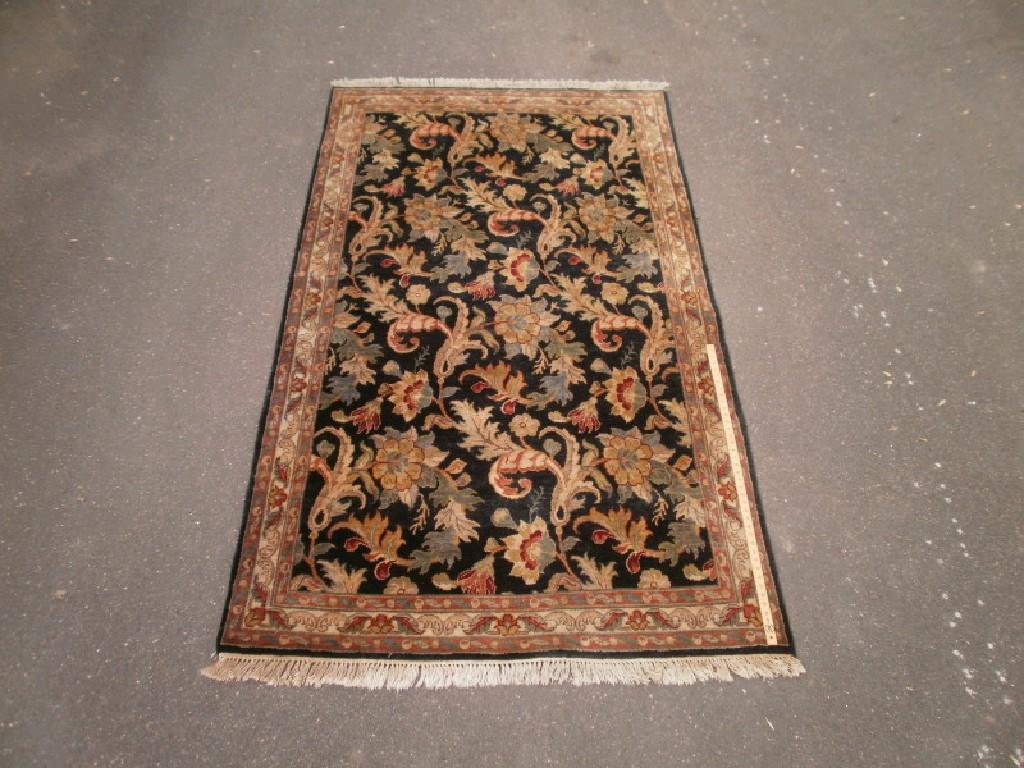 Appraisal: An Indian hand knotted wool carpet ft in x ft