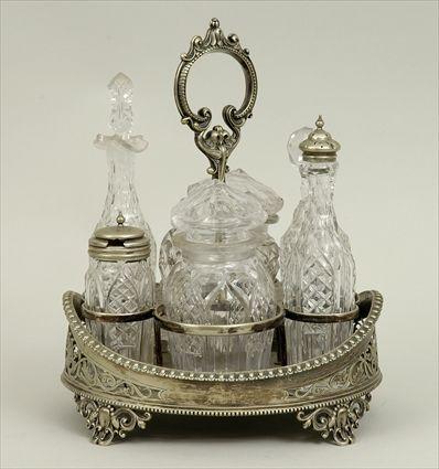 Appraisal: Victorian Silverplate Cruet Frame with Cut Glass Bottles Frame x