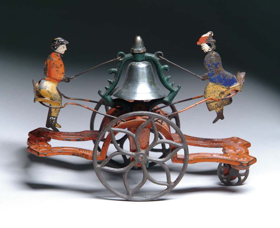 Appraisal: MALE AND FEMALE SEE-SAW BELL TOY Manufactured by The Gong