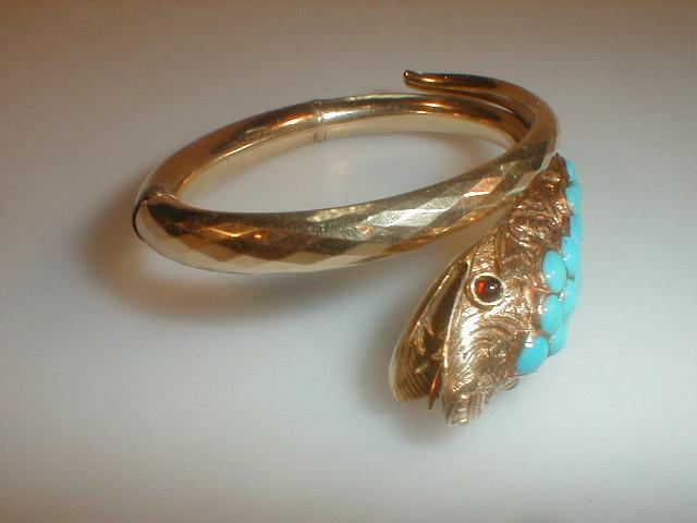 Appraisal: A Victorian hinged snake bangle the hollow body faceted to