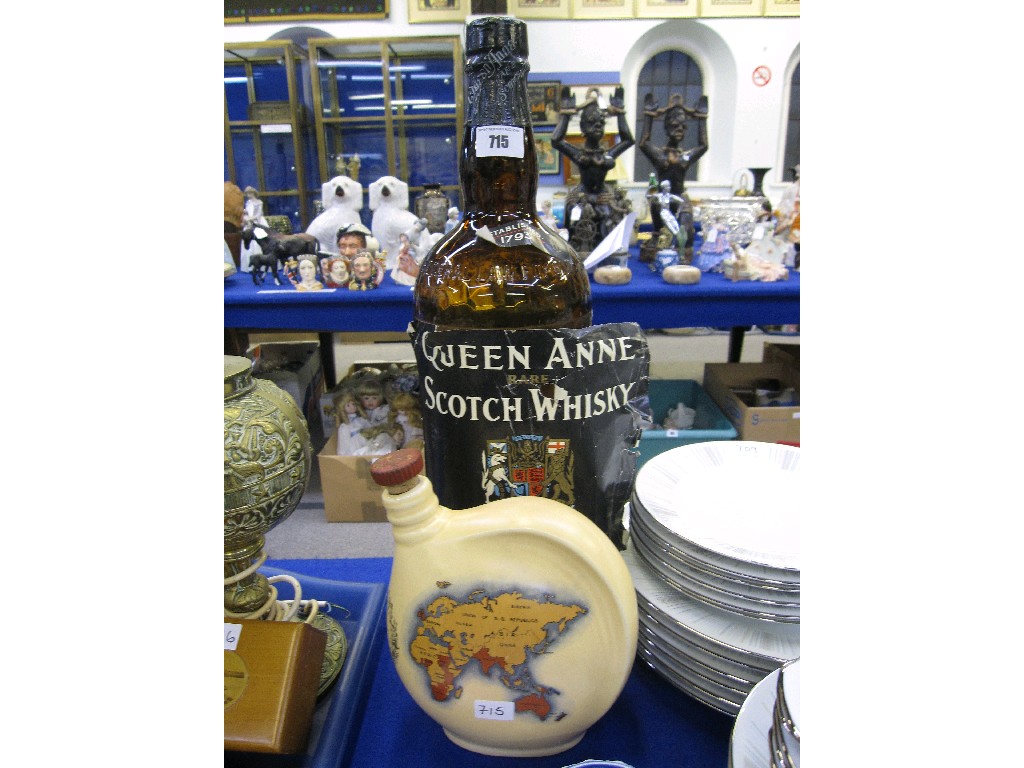 Appraisal: Large Queen Anne Scotch Whisky bottle and a Crown Ducal