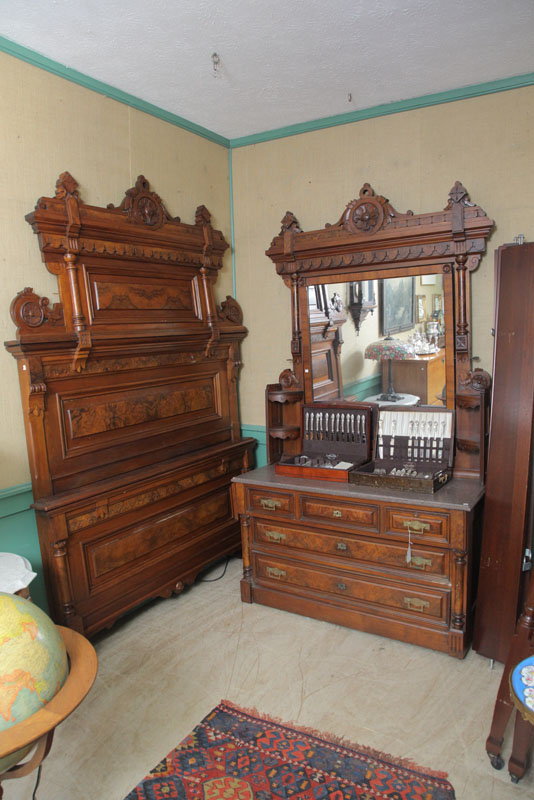 Appraisal: TWO PIECE VICTORIAN BEDROOM SUITE Walnut with carved crests burlwood