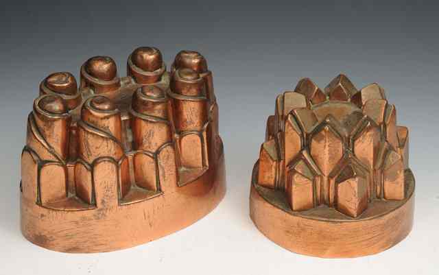 Appraisal: A PAIR OF TH CENTURY COPPER JELLY MOULDS