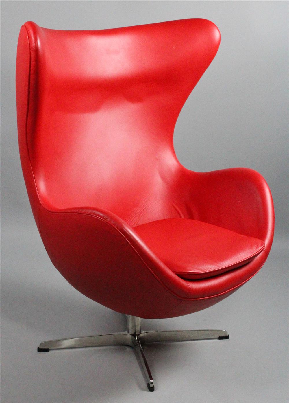 Appraisal: MODERNIST EGG STYLE BIOMORPHIC RED LEATHER SWIVEL CHAIR after the