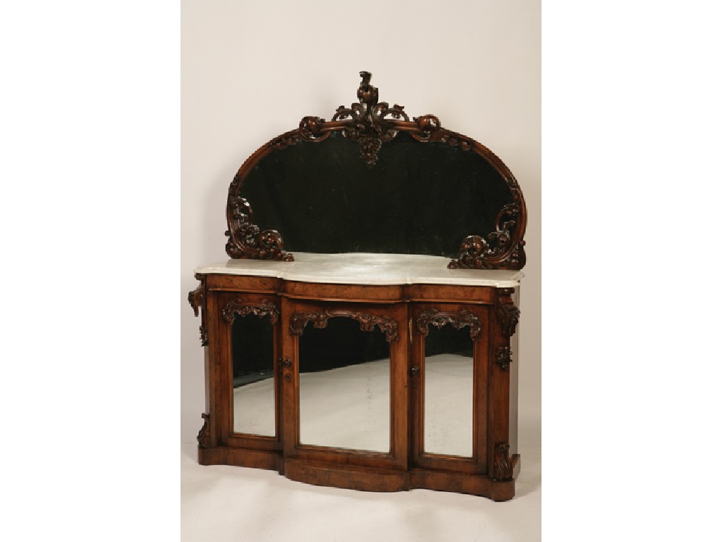 Appraisal: A VICTORIAN WALNUT AND MARBLE TOPPED SIDEBOARD the raised mirrored