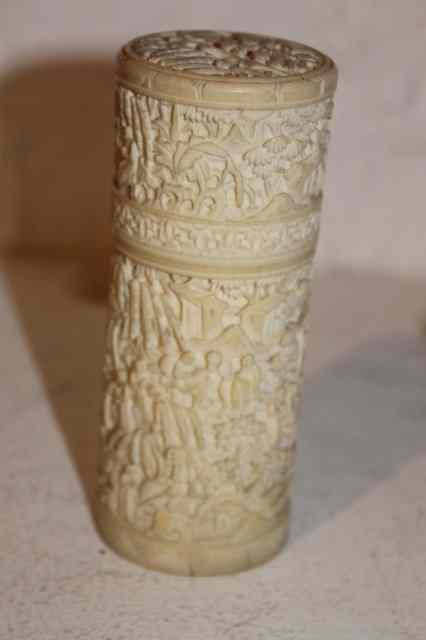 Appraisal: A CHINESE CANTON CARVED IVORY CYLINDRICAL CASE and cover with