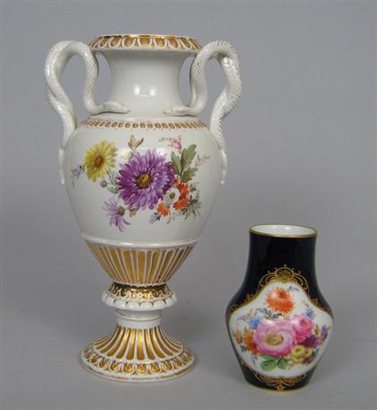 Appraisal: Continental porcelain vase White with painted floral decoration gilt detail