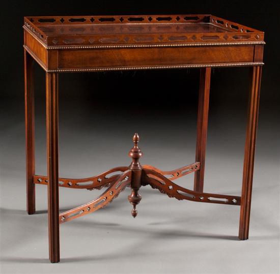 Appraisal: Georg III style mahogany silver table Baker th century with