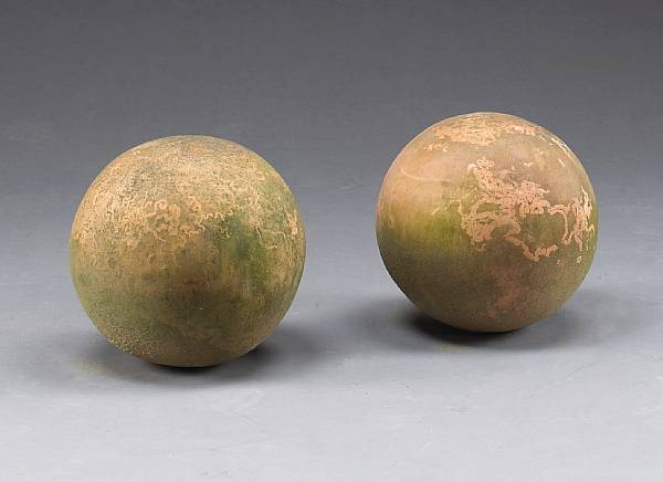 Appraisal: A set of four terracotta garden spheres Each of typical