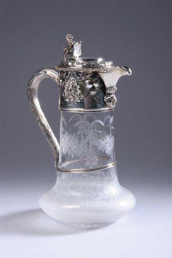 Appraisal: VICTORIAN SILVER-MOUNTED GLASS CLARET JUG ECB London Glass body with