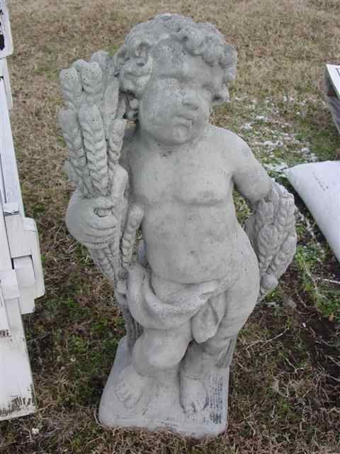 Appraisal: CAST STONE STATUE The miniature deity clasping a sheaf of