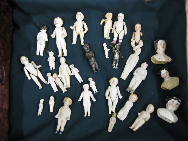 Appraisal: Collection of Miniature Porcelain Dolls plus some bisque includes frozen