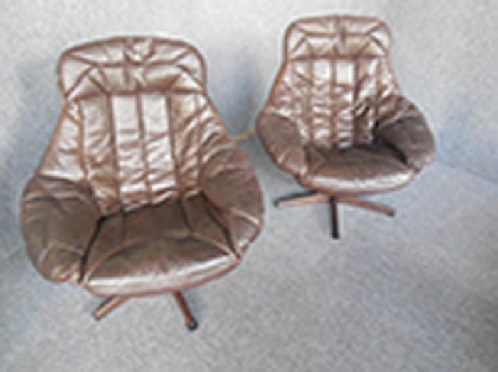 Appraisal: PAIR OF H W KLEIN NORWEGIAN BORN BROWN LEATHER ARMCHAIRS