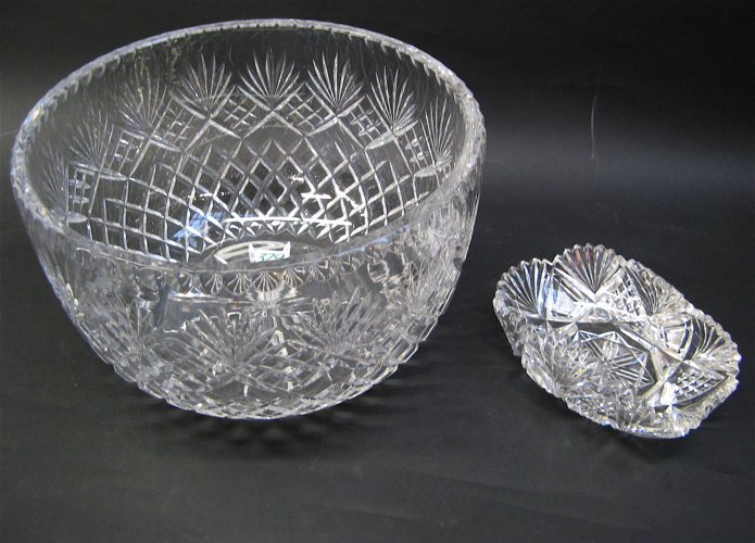 Appraisal: FIVE CLEAR CUT GLASS ITEMS includes bowls centerpiece bowl D