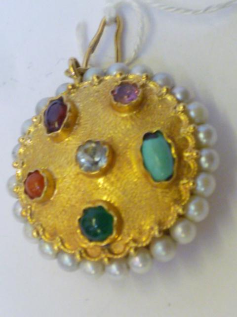 Appraisal: A MULTI-GEM PENDANT of circular form inset to both sides