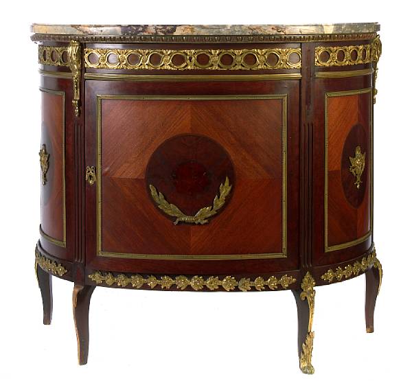 Appraisal: A Louis XVI style gilt bronze mounted mahogany commode losses