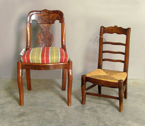 Appraisal: Child's saber leg chair together with a ladderback chair