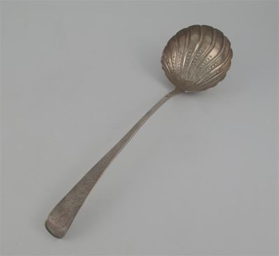 Appraisal: A George III Irish soup ladle with a fluted circular