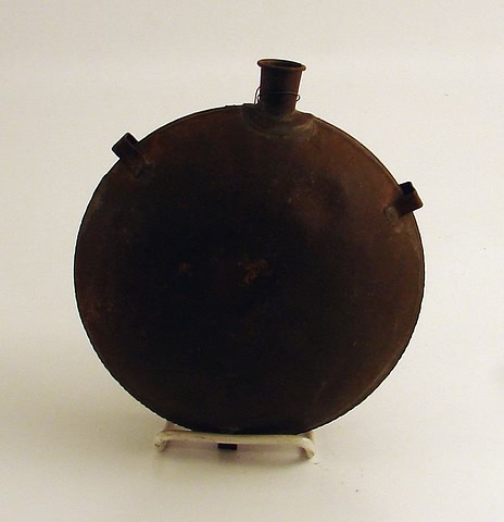 Appraisal: Smooth sided Civil War canteen lacking cloth cover and strap