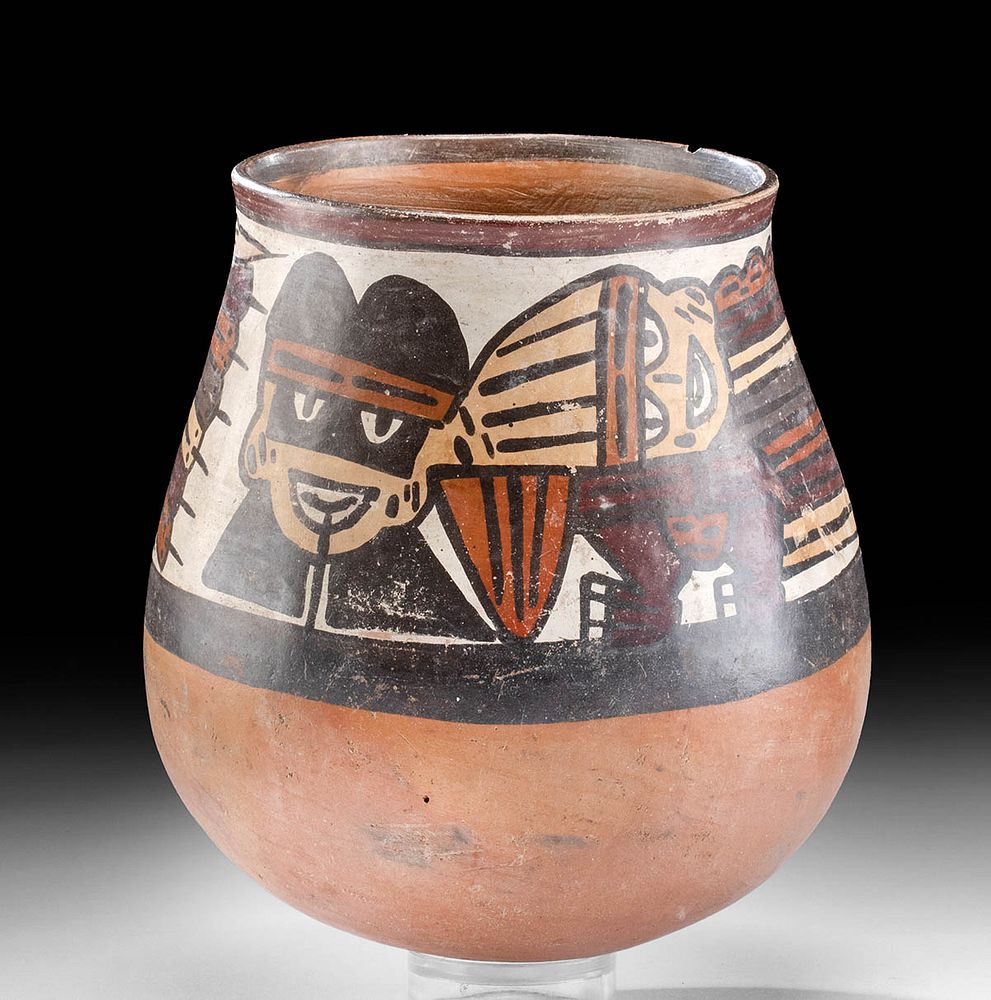 Appraisal: Nazca Polychrome Pottery Vessel w Trophy Heads Originally Listed At