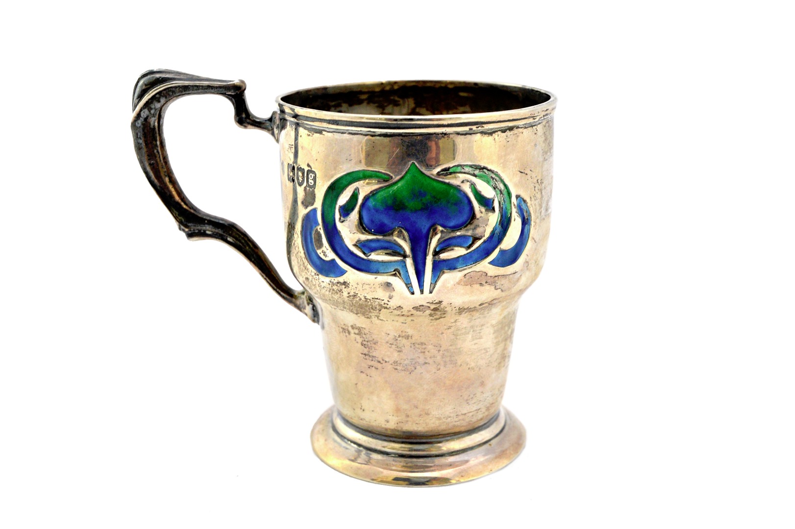 Appraisal: A silver and enamelled Art Nouveau mug having a shaped