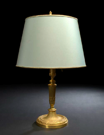 Appraisal: Tall French Gilt-Brass Candlestick in the Louis XVI style first