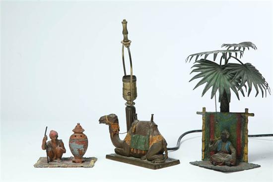 Appraisal: THREE ARABIAN-THEMED TABLE ITEMS Austria st half- th century bronzed