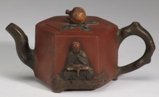 Appraisal: Chinese Yixing teapot w pomegranate l Chinese polychrome Yixing teapot