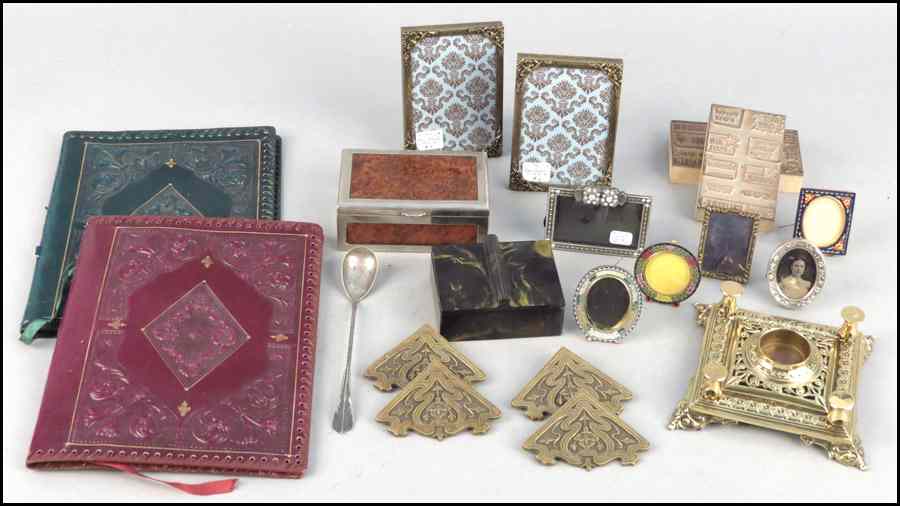 Appraisal: COLLECTION OF DECORATIVE ITEMS Comprised of embossed leather folios frames