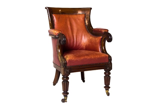 Appraisal: A William IV mahogany library bergere on reeded supports