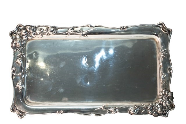 Appraisal: A European Art Nouveau shaped rectangular tray the border decorated