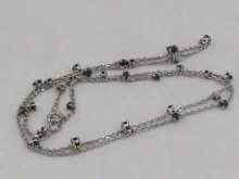 Appraisal: An carat white gold chain set with sapphires approx cm