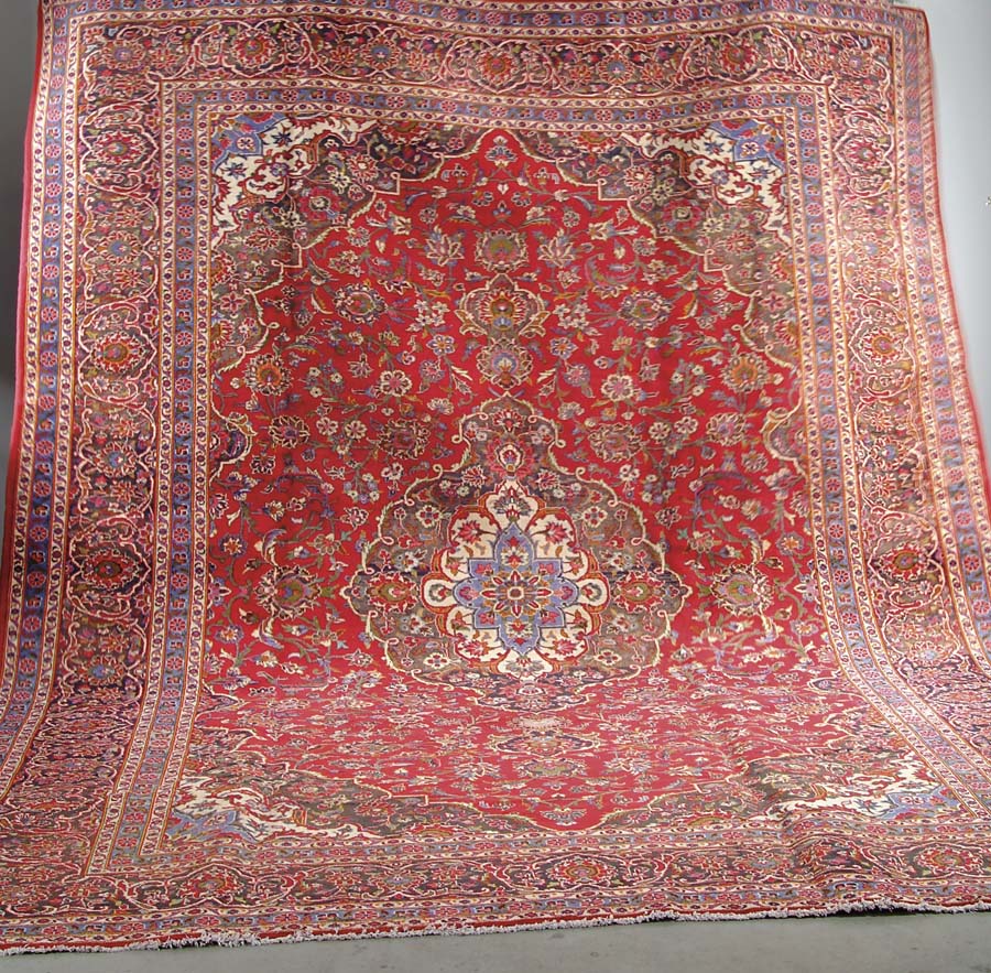 Appraisal: KASHAN ORIENTAL RUG Mid th Century Burgundy field with large