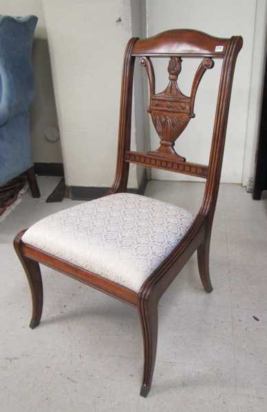 Appraisal: A SET OF SIX EMPIRE STYLE MAHOGANY DINING CHAIRS made