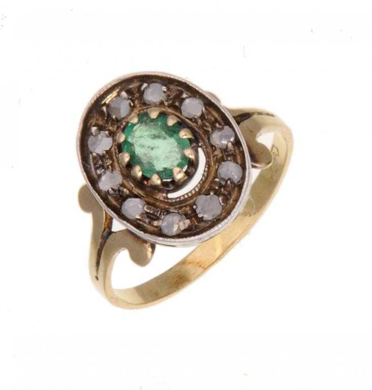 Appraisal: A FRENCH EMERALD AND ROSE DIAMOND OVAL CLUSTER RING gold