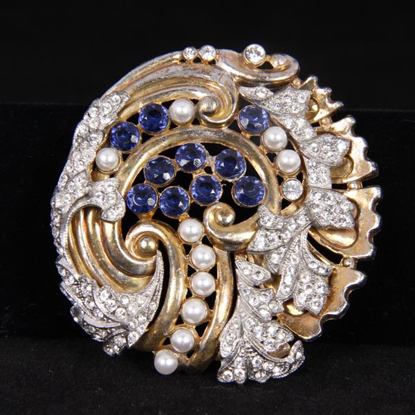 Appraisal: Sterling vermeil layered pave pin clip with sapphire blue jewels