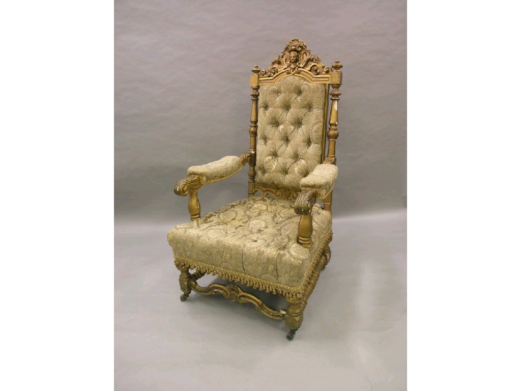 Appraisal: A pair of Louis XIV-style giltwood armchairs each with elaborate