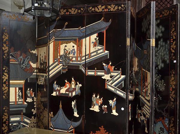 Appraisal: A CHINESE BLACK LACQUERED PAINTED AND CARVED EIGHT PANEL SCREEN