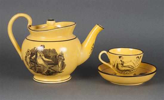 Appraisal: French Creilware teapot and a matching cup and saucer early