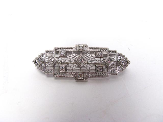 Appraisal: Vintage K white gold filigree vintage pin set with accent