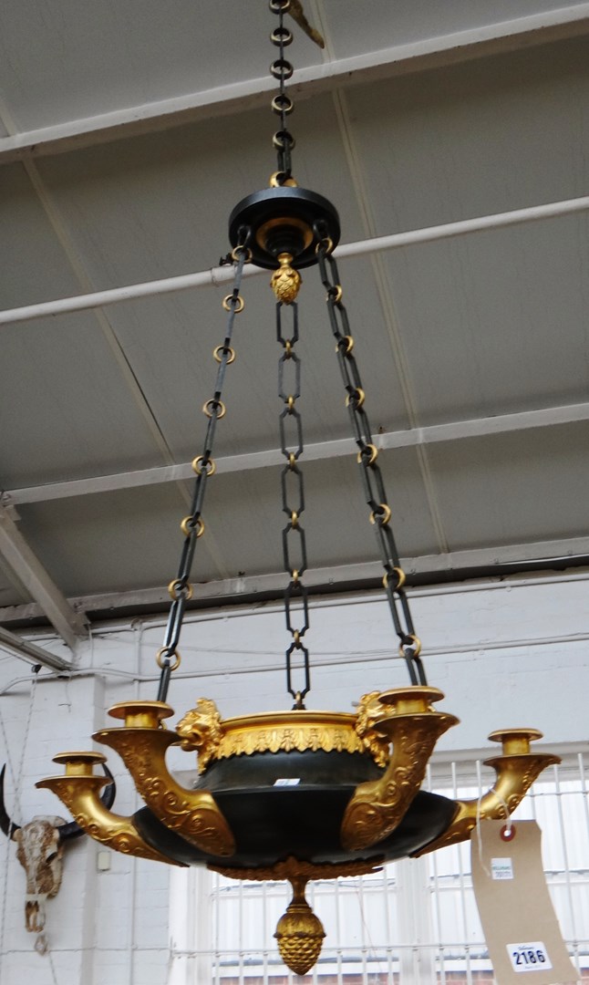 Appraisal: A French gilt bronze and bronze chandelier of Empire style