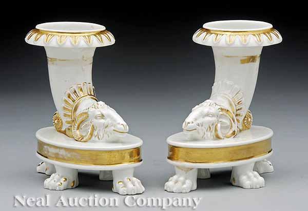 Appraisal: A Pair of Paris Porcelain Gilt-Decorated Rhyton Spill Vases mid-