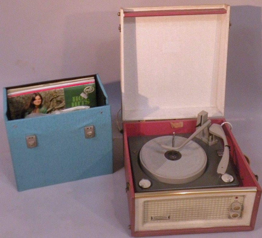 Appraisal: A mid- thC Dansette record player with articulated plastic interior