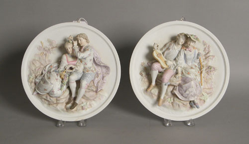 Appraisal: Pair of painted bisque plaques early th c dia