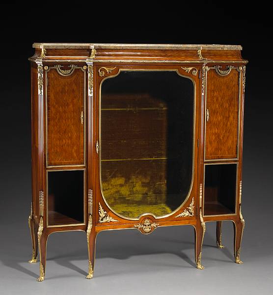 Appraisal: A Louis XVI style gilt bronze mounted parquetry vitrine cabinet