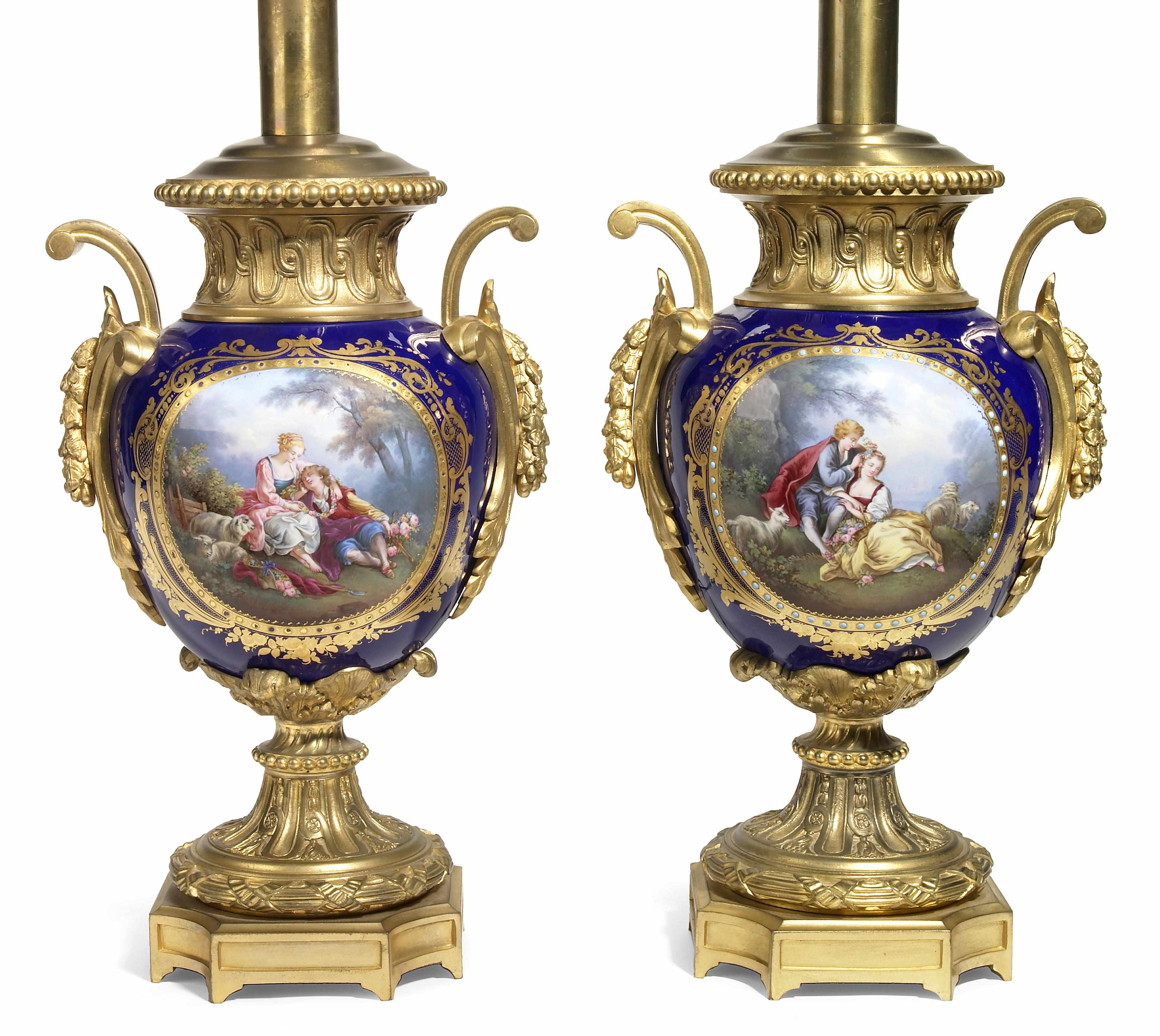 Appraisal: A pair of Louis XVI style gilt bronze mounted 'jeweled'