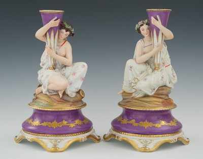 Appraisal: A Fine Pair of Biscuit and Glazed Porcelain Figural Candleholders