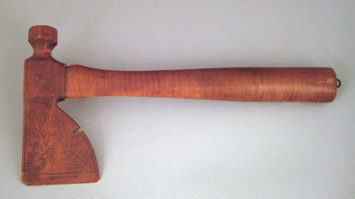 Appraisal: Folk art tiger maple hatchet dated signed W Printz with